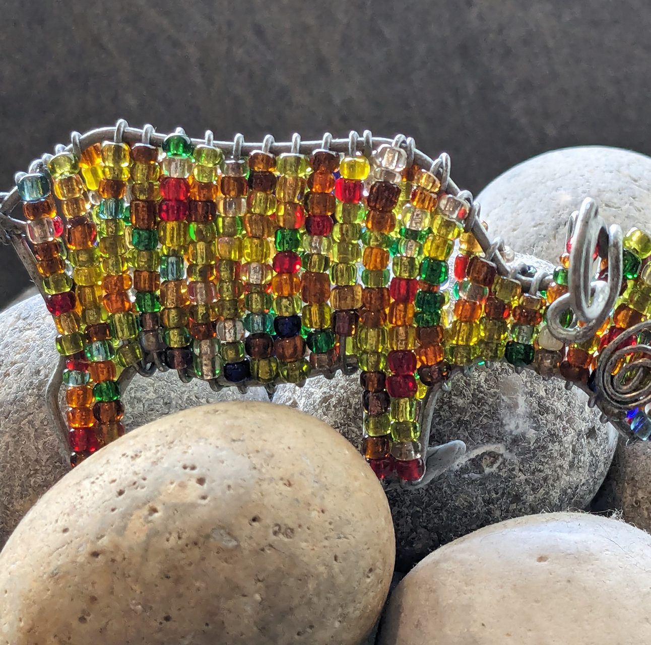 A beaded keyring in the shape of a buffalo